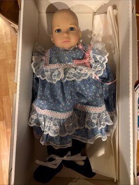 Götz Collectible Dolls - 18” Baby with Blue Lace Dress. New in Box